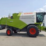 Kombajn zbożowy Claas Tucano 440 z hederem C660