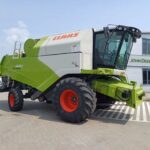 Kombajn zbożowy Claas Tucano 440 z hederem C660