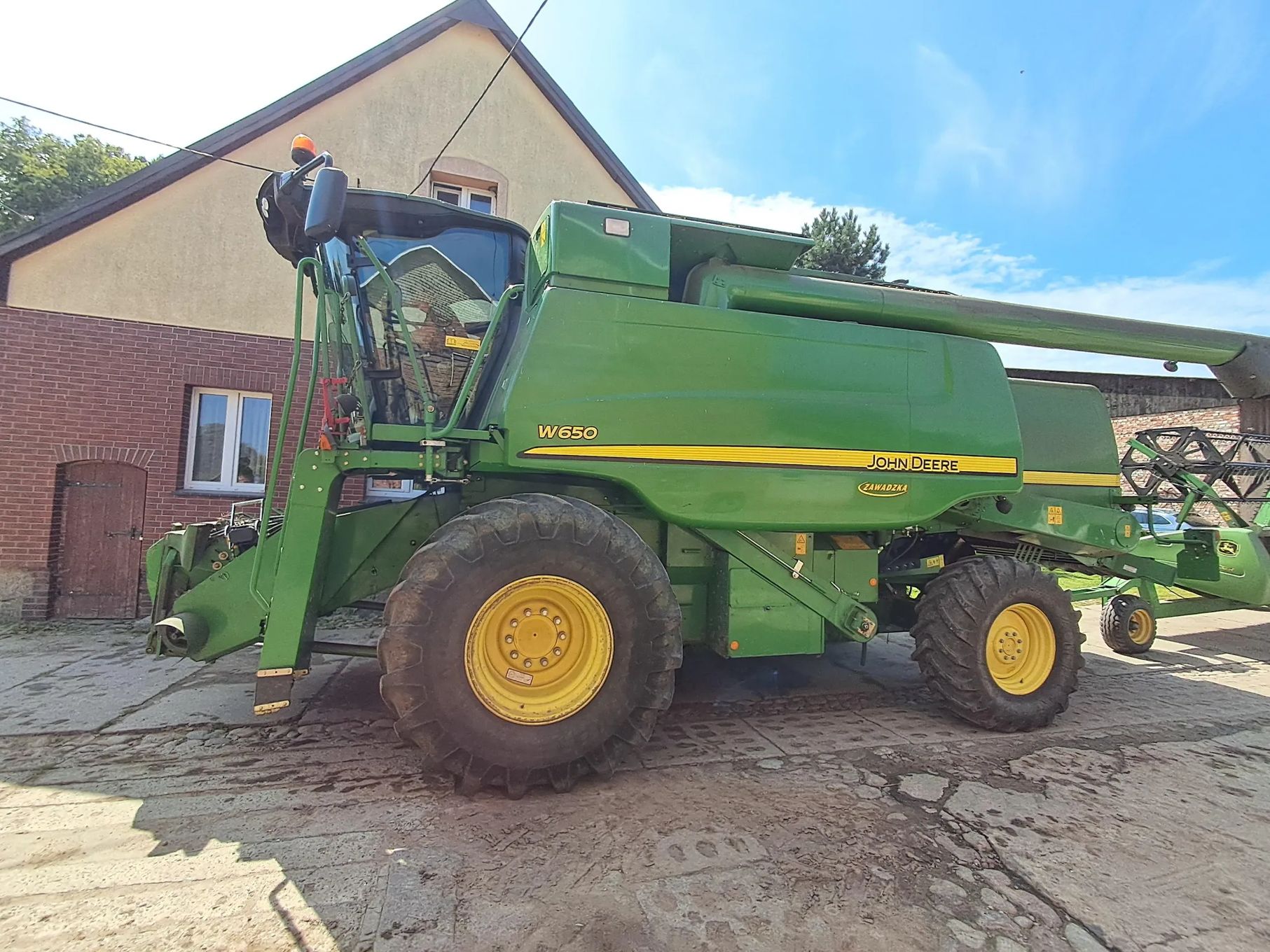 Kombajn zbożowy John Deere W650 Krajowy